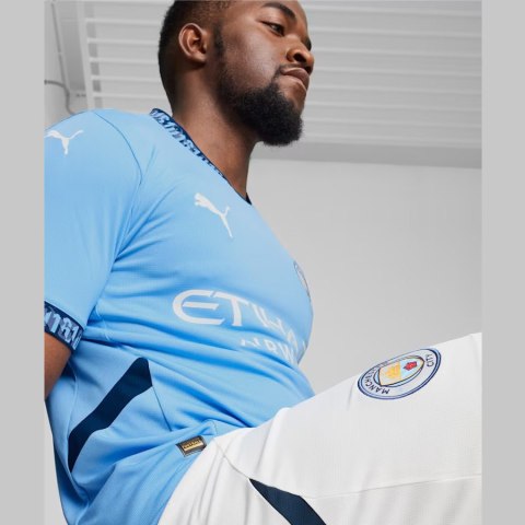 Koszulka Puma Manchester City Home JSY Replika 775075-01 niebieski L Puma