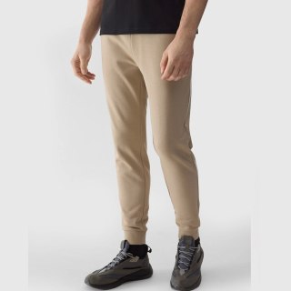Spodnie 4F 4FWSS24TTROM603 83S beżowy XXL 4F