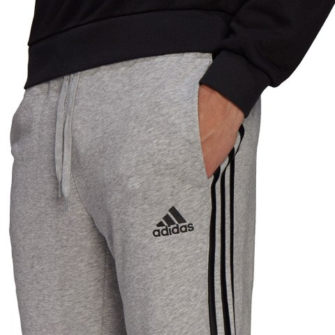 Spodnie męskie adidas Essentials Tapered Elastic Cuff 3 Stripes Pant szare GK9001 Adidas Spodnie męskie adidas Essentials Tapered Elastic Cuff 3 Stripes Pant szare GK9001 Adidas