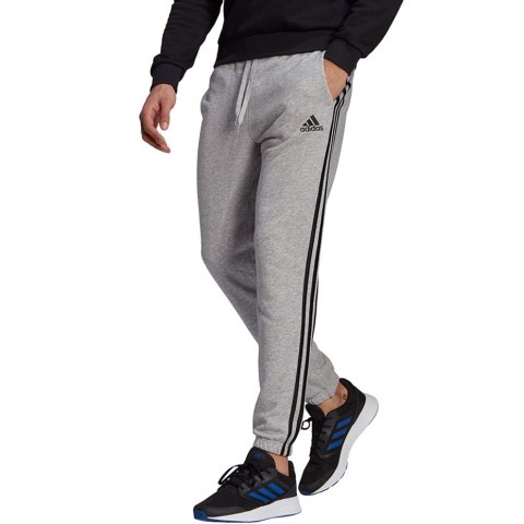 Spodnie męskie adidas Essentials Tapered Elastic Cuff 3 Stripes Pant szare GK9001 Adidas Spodnie męskie adidas Essentials Tapered Elastic Cuff 3 Stripes Pant szare GK9001 Adidas