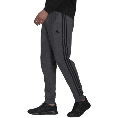 Spodnie męskie adidas Essentials French Terry Tapered Cuff 3-Stripes Pants szare H12256 Adidas Spodnie męskie adidas Essentials French Terry Tapered Cuff 3-Stripes Pants szare H12256 Adidas