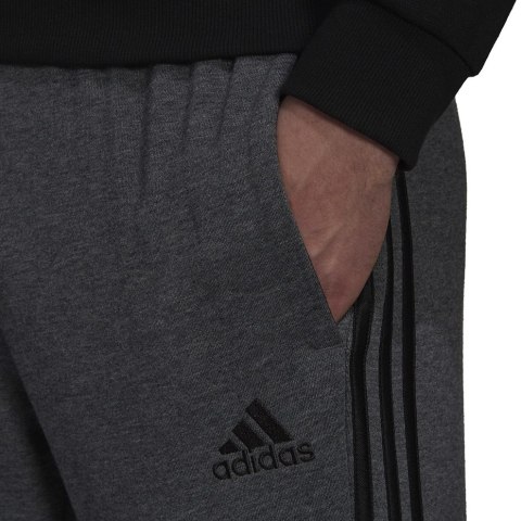 Spodnie męskie adidas Essentials French Terry Tapered Cuff 3-Stripes Pants szare H12256 Adidas Spodnie męskie adidas Essentials French Terry Tapered Cuff 3-Stripes Pants szare H12256 Adidas