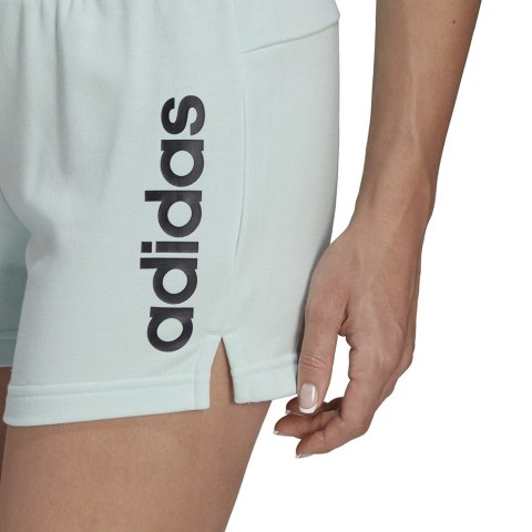 Spodenki damskie adidas Essentials Slim Logo Shorts turkusowe HE9363 Adidas Spodenki damskie adidas Essentials Slim Logo Shorts turkusowe HE9363 Adidas