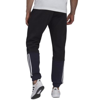 Spodnie męskie adidas Essentials Colorblock Fleece granatowe HK2884 Adidas