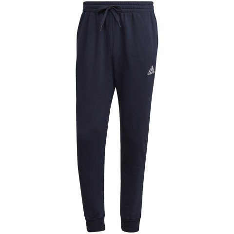 Spodnie męskie adidas Essentials Fleece Regular Tapered granatowe HL2231 Adidas Spodnie męskie adidas Essentials Fleece Regular Tapered granatowe HL2231 Adidas