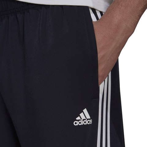 Spodnie męskie adidas Primegreen Essentials Warm-Up granatowe H46106 Adidas Spodnie męskie adidas Primegreen Essentials Warm-Up granatowe H46106 Adidas