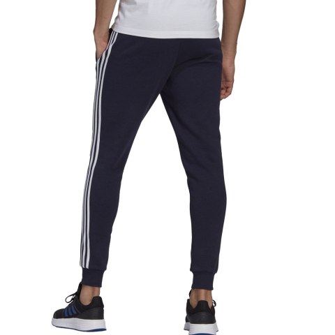 Spodnie męskie adidas Essentials Slim 3 Stripes Pants granatowe GM1090 S Adidas
