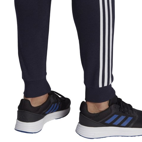 Spodnie męskie adidas Essentials Slim 3 Stripes Pants granatowe GM1090 S Adidas