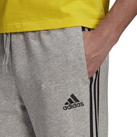 Spodnie męskie adidas Essentials Tapered Cuff 3 Stripes szare GK8889 S Adidas