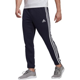 Spodnie męskie adidas Essentials Tapered Elastic Cuff 3 Stripes Pant granatowe GK8830 S Adidas