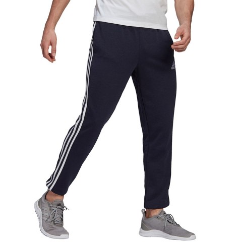 Spodnie męskie adidas Essentials Tapered Elastic Cuff 3 Stripes Pant granatowe GK8830 S Adidas