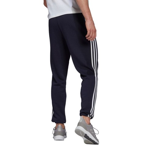 Spodnie męskie adidas Essentials Tapered Elastic Cuff 3 Stripes Pant granatowe GK8830 S Adidas