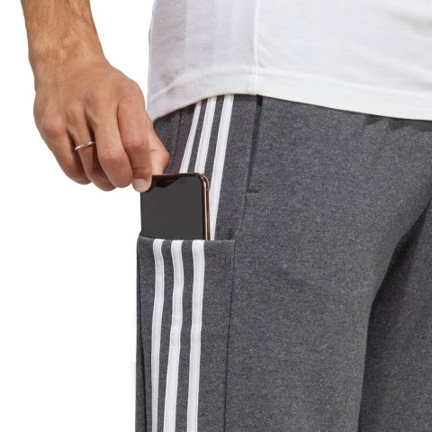 Spodnie męskie adidas Essentials French Terry Tapered Cuff 3-Stripes szare IC9408 Adidas Spodnie męskie adidas Essentials French Terry Tapered Cuff 3-Stripes szare IC9408 Adidas