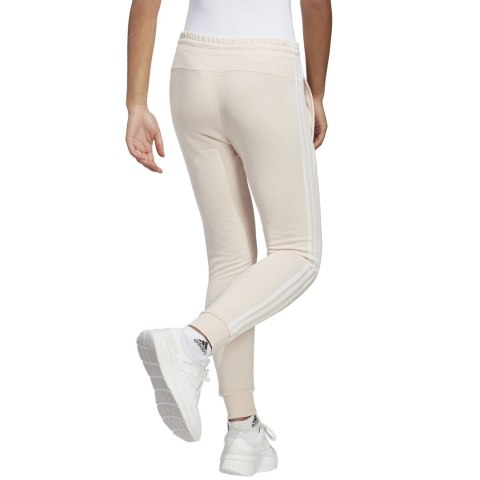 Spodnie damskie adidas Essentials 3-Stripes French Terry Cuffed kremowe IC9924 Adidas Spodnie damskie adidas Essentials 3-Stripes French Terry Cuffed kremowe IC9924 Adidas