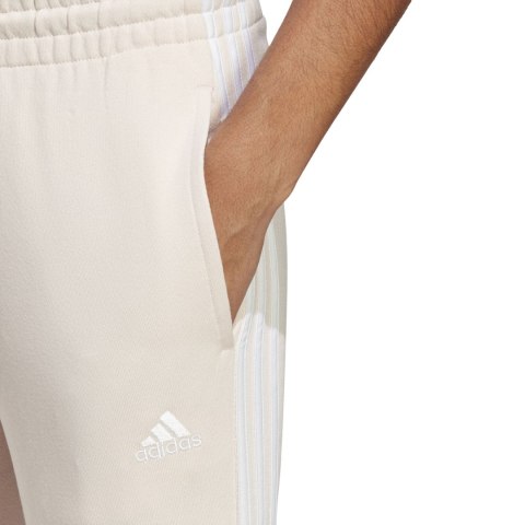 Spodnie damskie adidas Essentials 3-Stripes French Terry Cuffed kremowe IC9924 Adidas Spodnie damskie adidas Essentials 3-Stripes French Terry Cuffed kremowe IC9924 Adidas