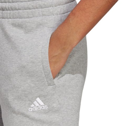 Spodnie damskie adidas Essentials Linear French Terry Cuffed szare IC8816 Adidas Spodnie damskie adidas Essentials Linear French Terry Cuffed szare IC8816 Adidas