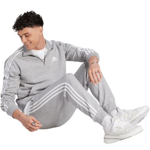 Spodnie męskie adidas Essentials Fleece 3-Stripes Tapered Cuff szare IJ6494 Adidas Spodnie męskie adidas Essentials Fleece 3-Stripes Tapered Cuff szare IJ6494 Adidas