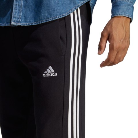 Spodnie męskie adidas Essentials French Terry Tapered Cuff 3-Stripes czarne HA4337 Adidas