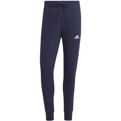 Spodnie męskie adidas Essentials French Terry Tapered Cuff 3-Stripes granatowe IC9406 Adidas Spodnie męskie adidas Essentials French Terry Tapered Cuff 3-Stripes granatowe IC9406 Adidas