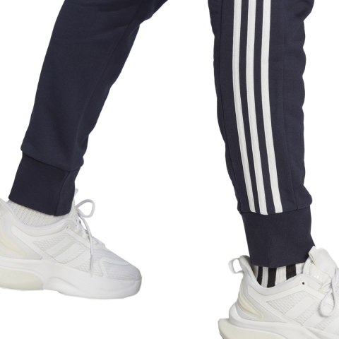 Spodnie męskie adidas Essentials French Terry Tapered Cuff 3-Stripes granatowe IC9406 Adidas Spodnie męskie adidas Essentials French Terry Tapered Cuff 3-Stripes granatowe IC9406 Adidas