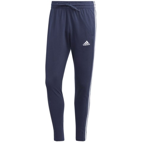 Spodnie męskie adidas Essentials Single Jersey Tapered Open Hem 3-Stripes granatowe IC0045 S Adidas