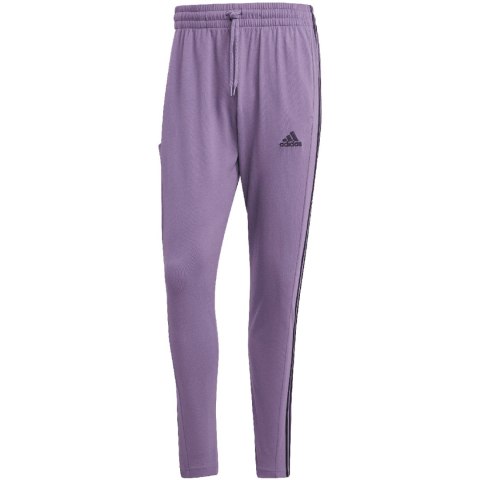 Spodnie męskie adidas Essentials Single Jersey Tapered Open Hem 3-Stripes fioletowe IJ8699 L Adidas