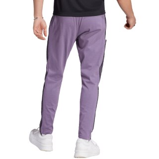 Spodnie męskie adidas Essentials Single Jersey Tapered Open Hem 3-Stripes fioletowe IJ8699 M Adidas