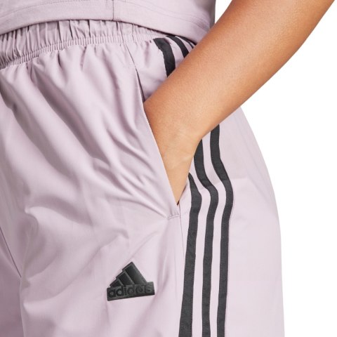 Spodnie damskie adidas Future Icons Three Stripes Woven różowe IS3655 L Adidas