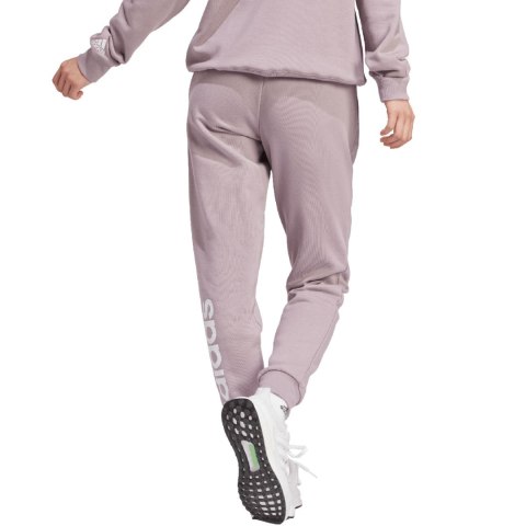 Spodnie damskie adidas Essentials Linear French Terry Cuffed fioletowe IS2105 Adidas Spodnie damskie adidas Essentials Linear French Terry Cuffed fioletowe IS2105 Adidas