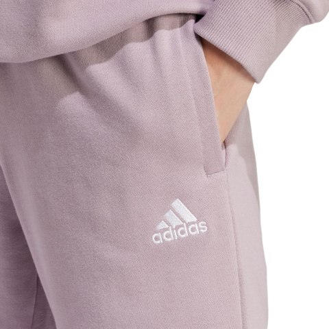 Spodnie damskie adidas Essentials Linear French Terry Cuffed fioletowe IS2105 Adidas Spodnie damskie adidas Essentials Linear French Terry Cuffed fioletowe IS2105 Adidas