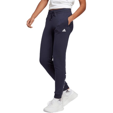 Spodnie damskie adidas Essentials Linear French Terry Cuffed granatowe IC6869 Adidas Spodnie damskie adidas Essentials Linear French Terry Cuffed granatowe IC6869 Adidas