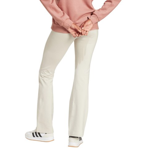 Legginsy damskie adidas Essentials Small Logo Flared kremowe JD3072 L Adidas