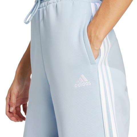 Spodnie damskie adidas Essentials 3-Stripes Fleece Wide błękitne IR5384 Adidas Spodnie damskie adidas Essentials 3-Stripes Fleece Wide błękitne IR5384 Adidas