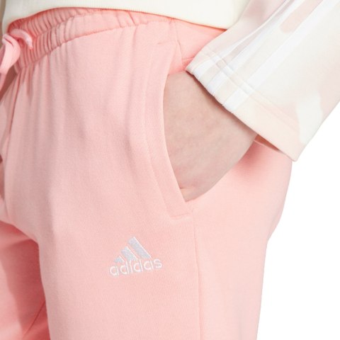 Spodnie damskie adidas Linear French Terry Cuffed jasnoróżowe IY9200 Adidas Spodnie damskie adidas Linear French Terry Cuffed jasnoróżowe IY9200 Adidas