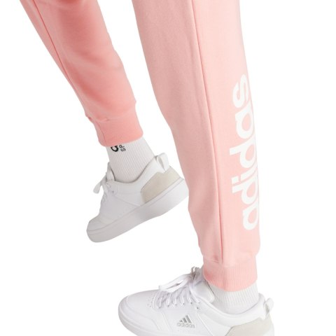 Spodnie damskie adidas Linear French Terry Cuffed jasnoróżowe IY9200 Adidas Spodnie damskie adidas Linear French Terry Cuffed jasnoróżowe IY9200 Adidas