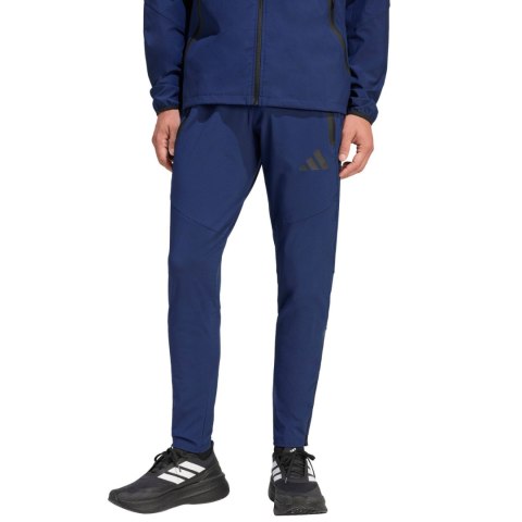 Spodnie męskie adidas Tiro 26 Travel Woven granatowe KE8364 M Adidas teamwear