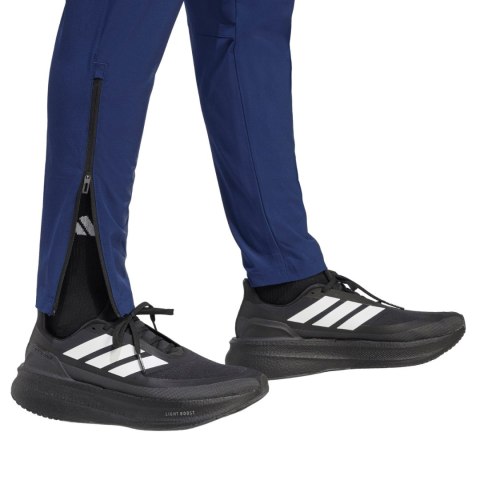 Spodnie męskie adidas Tiro 26 Travel Woven granatowe KE8364 M Adidas teamwear