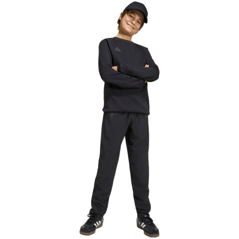 Spodnie dla dzieci adidas Tiro 26 Travel Woven czarne JM5556 152cm Adidas teamwear