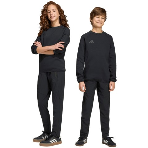 Spodnie dla dzieci adidas Tiro 26 Travel Woven czarne JM5556 152cm Adidas teamwear