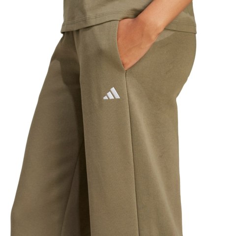Spodnie damskie adidas Essentials Small Logo Feel Cozy oliwkowe JI6054 Adidas Spodnie damskie adidas Essentials Small Logo Feel Cozy oliwkowe JI6054 Adidas