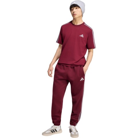 Spodnie męskie adidas Essentials 3-Stripes Fleece Tapered Cuffed bordowe KY4134 M Adidas