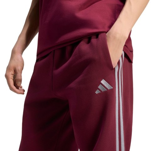 Spodnie męskie adidas Essentials 3-Stripes Fleece Tapered Cuffed bordowe KY4134 S Adidas